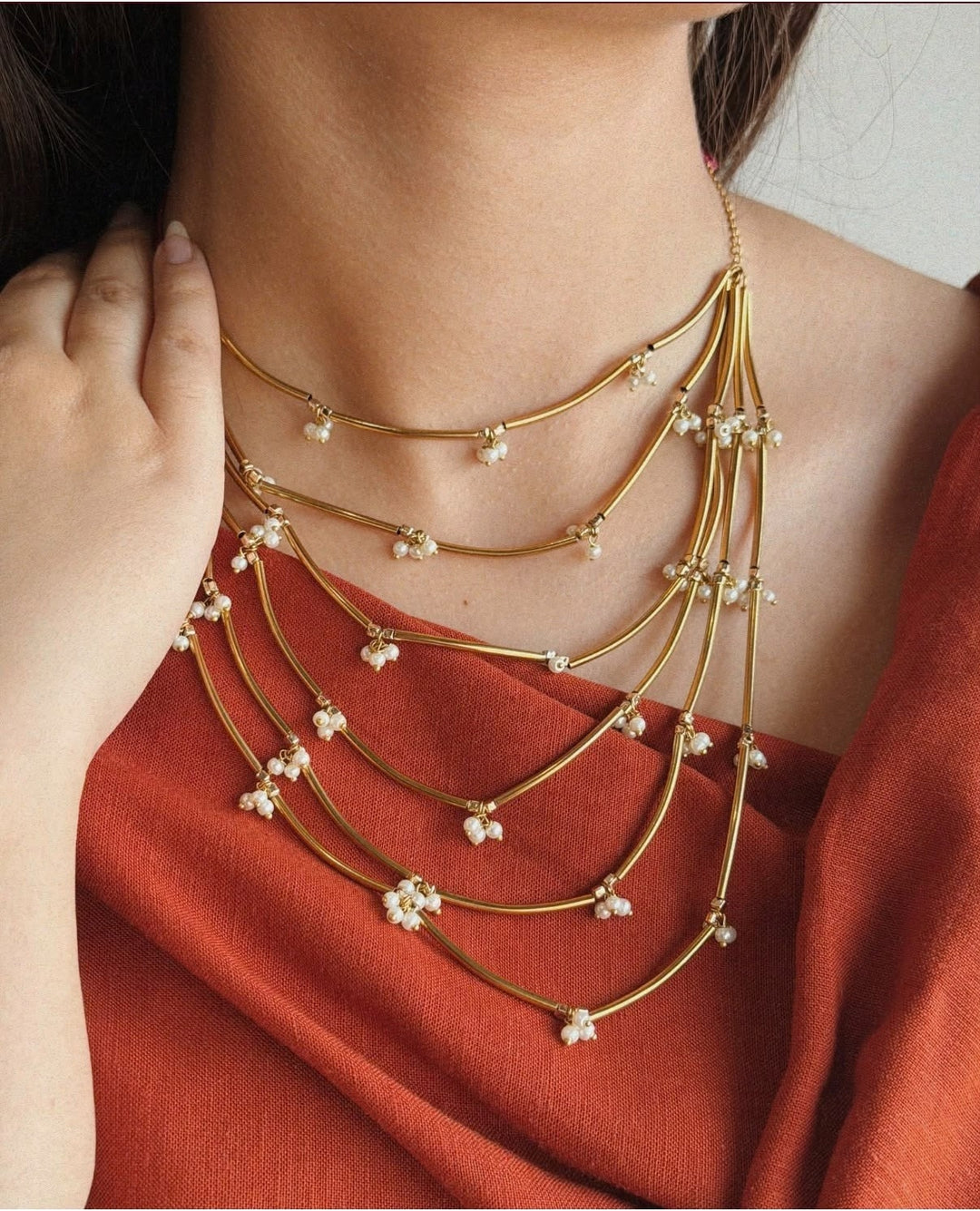 Graduated Draped Strands with Delicate Bead Accents